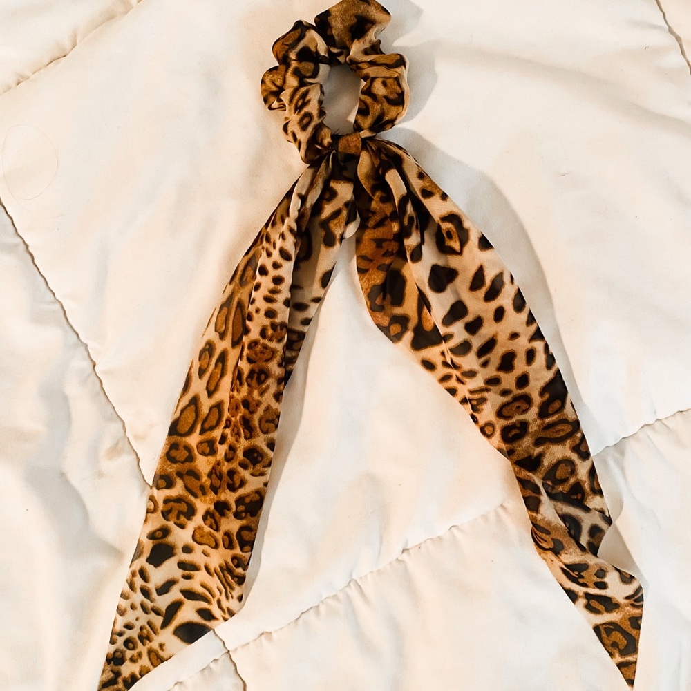 Scrunchie with attached fabric for fun bows or leave it down!